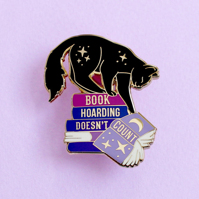 Everybody loves a neat and tidy space, but those groaning book shelves definitely don’t count! 

This fab enamel pin is perfect for book lovers – either as a little treat for yourself, or a gift for the bookworm in your life.  

Measurements: 43mm