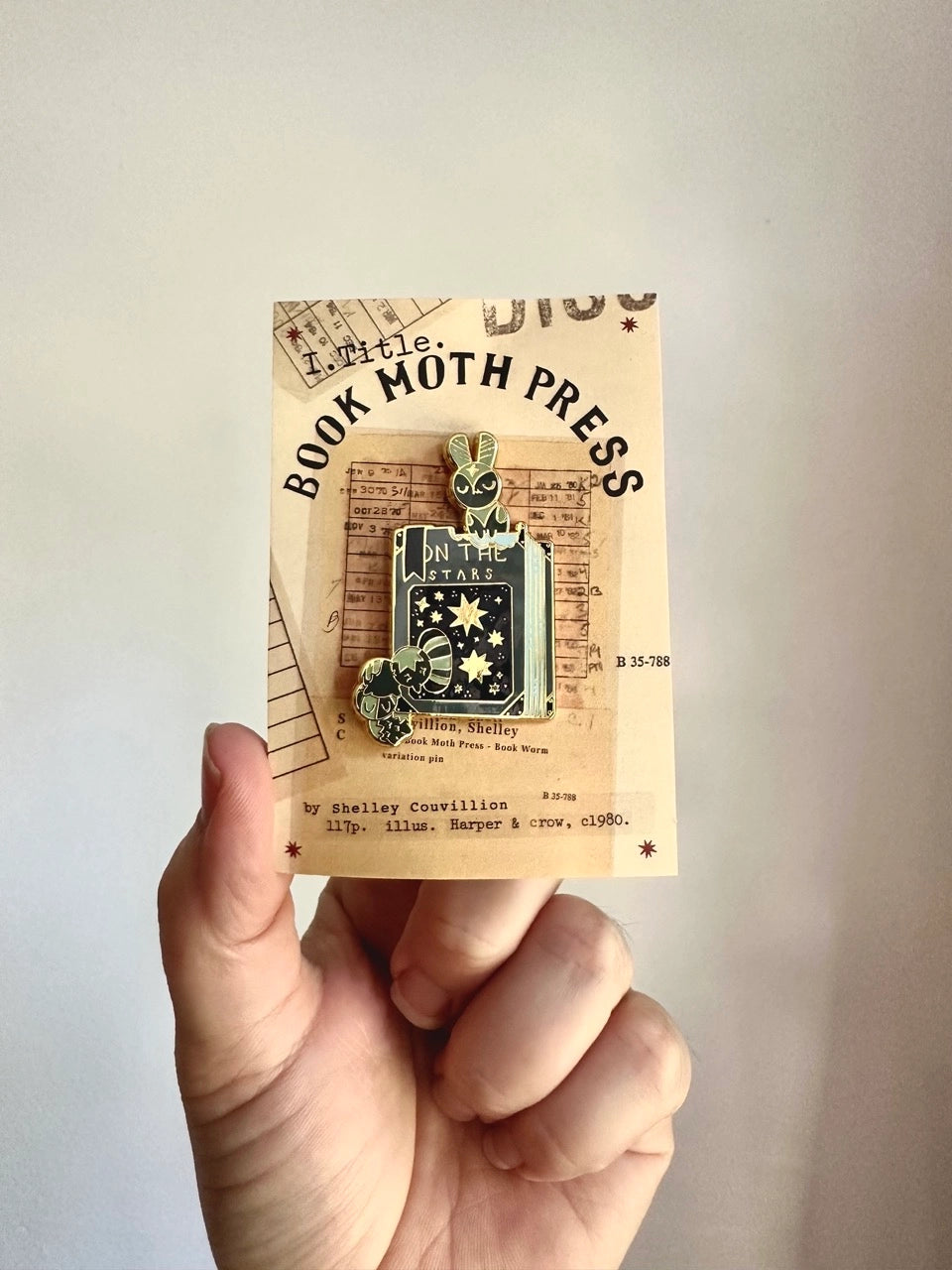These pins are a lovely, small and cute piece to show off on your clothes, book bags, or wherever you show off your pins!

1.65 inches tall, gold metal lapel pin with "hard" enamel colors. Black rubber clasps. Packaged in a small plastic bag with a card backing.