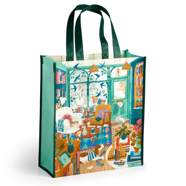 Carry your groceries and essentials in eco-friendly style with the Bookshop Afternoon Reusable Shopping Bag (artwork by Victoria Ball). Lightweight and durable, this bag is crafted from eco-friendly materials, making it the perfect sustainable choice for your shopping trips and travels. Featuring charming artwork inspired by books, it adds a touch of whimsy to your errands. With ample space and sturdy handles, it's perfect for carrying groceries, books, or travel essentials. 