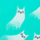A spooky sticker indeed! Looks like the nine lives are up for this cat, and a slinky specter is all that remains. This 3" clear sticker is purrfect for adorning water bottles, laptops, and more. Drop one in an envelope along with a card as a little treat.