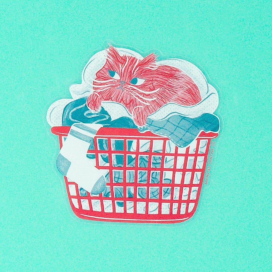 Is there anything cozier that curling up in a basket of warm laundry? This 3" clear sticker is purrfect for adorning water bottles, laptops, and more.