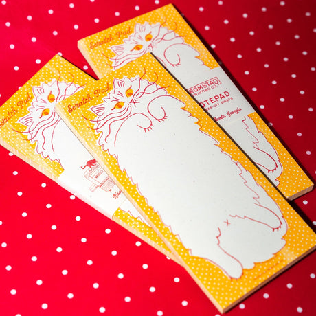 Beware the belly of this cat, you might get scratched as you scratch out your notes. Risograph printed in sunflower yellow and bright red with red glue on the top edge.