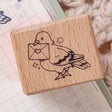 A small wood stamp of a little pigeon delivering your mail for your planner and scrapbooking needs. Each stamp measures approximately 1 x 0.75 inch.

Stamps come loose and without any extra packaging.