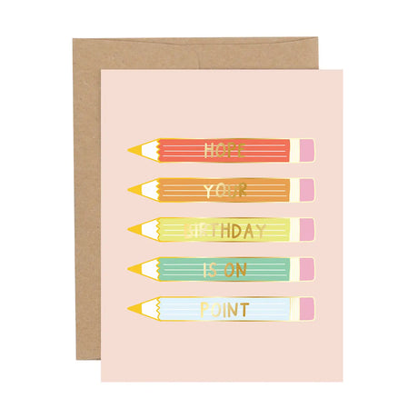 Celebrate a birthday with creative flair using our On-Point Birthday Greeting Card! This delightful card features a playful design adorned with colorful pencils, perfectly capturing the essence of creativity and fun.

&nbsp;•Size: 4.25" x 5.5"

•Features: Blank interior, coordinating envelope, gold foil