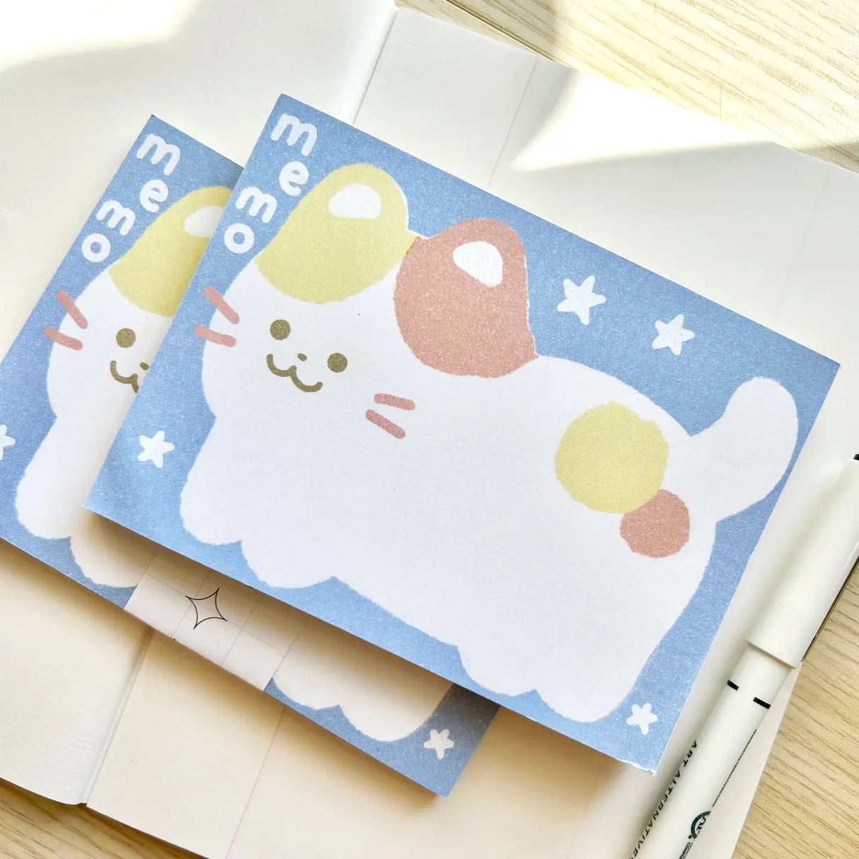 Chocolett - Kitty Memo Pad

This memopad comes with 50 thick pages and measures 5.5 x 4 inches big. It’s cutely decorated with a giant kitty for all your notes and memos.

Please note that these are not sticky notes.

Includes 1 memo pad