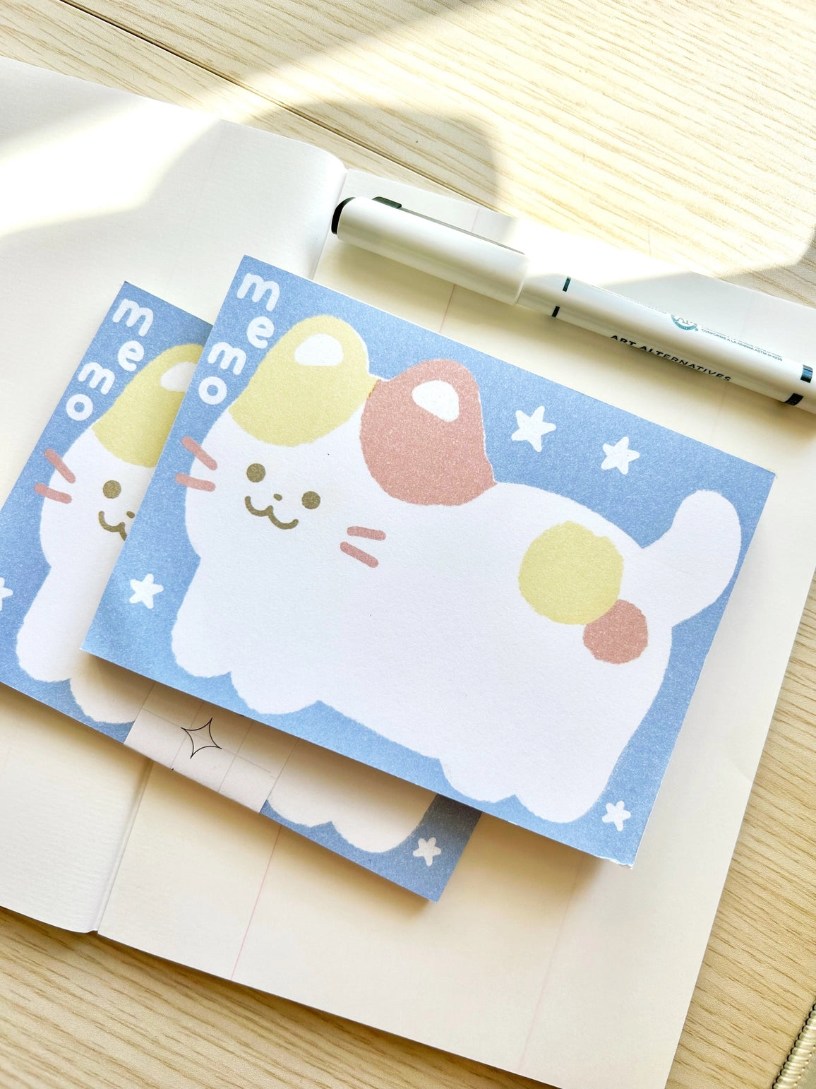 Chocolett - Kitty Memo Pad

This memopad comes with 50 thick pages and measures 5.5 x 4 inches big. It’s cutely decorated with a giant kitty for all your notes and memos.

Please note that these are not sticky notes.

Includes 1 memo pad