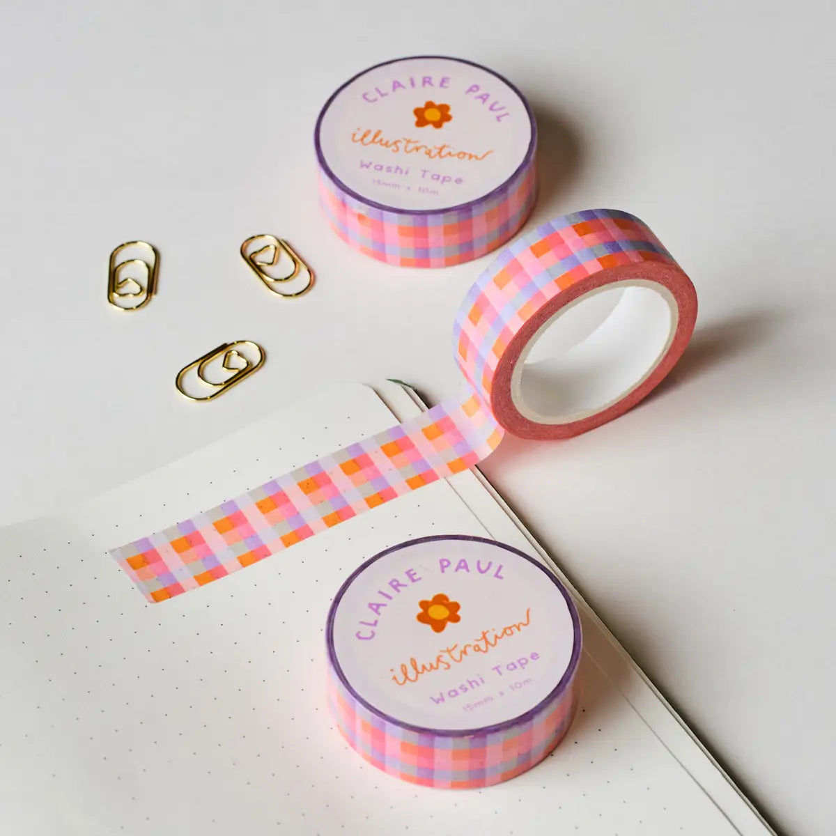 Cute &amp; colourful hand drawn gingham washi tape!

This paper masking tape is perfect for decorating your bullet journal and planners, scrapbooking &amp; gift wrapping. It'll add some fun and colour to any surface and is easy to peel off.

10m x 15mm