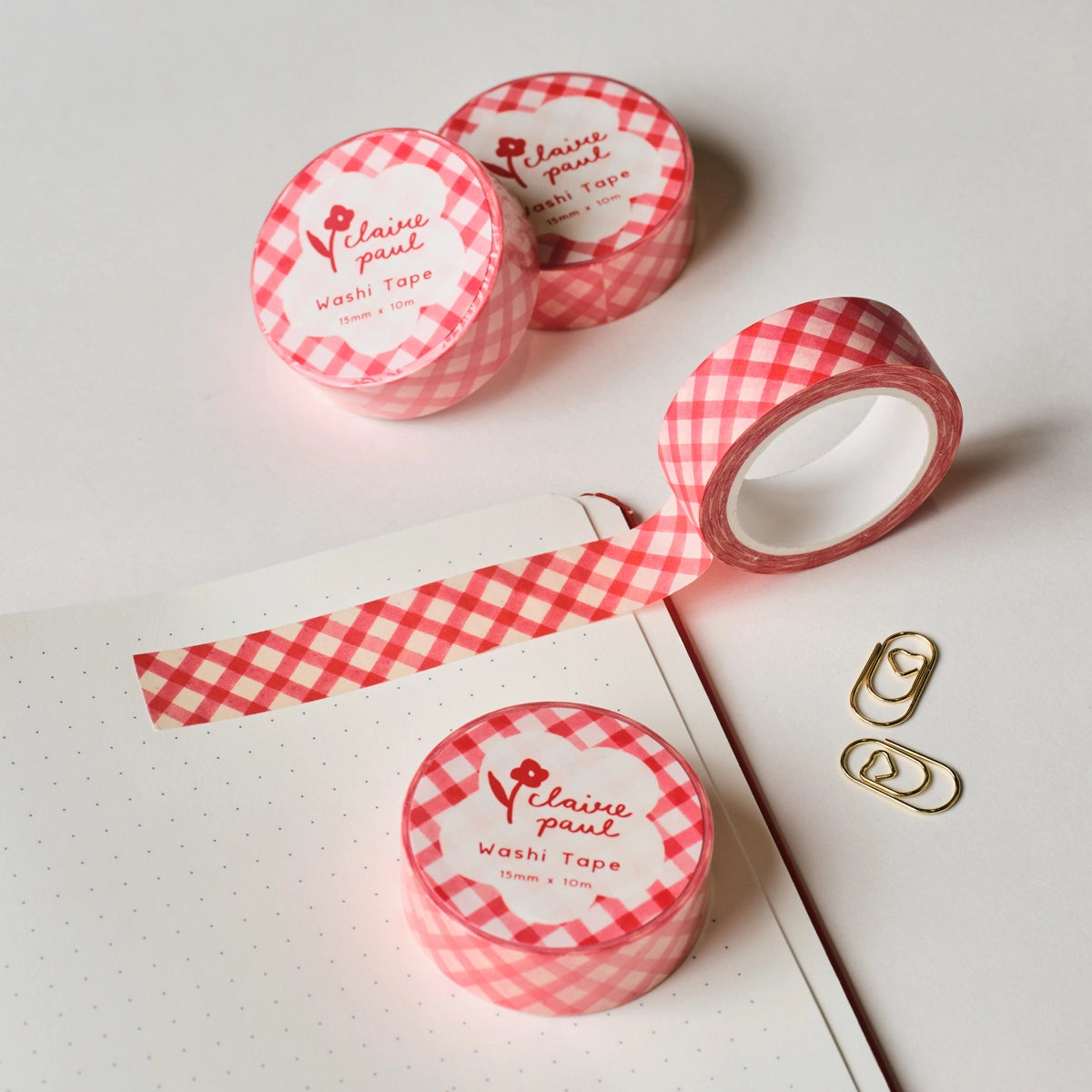 Very cute hand drawn red gingham pattern washi masking tape!

This paper masking tape is perfect for decorating your bullet journal and planners, scrapbooking &amp; gift wrapping. It'll add some fun and colour to any surface and is easy to peel off.

10m x 15mm