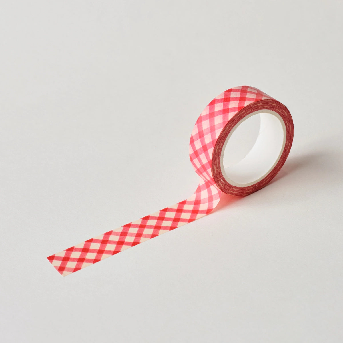 Very cute hand drawn red gingham pattern washi masking tape!

This paper masking tape is perfect for decorating your bullet journal and planners, scrapbooking &amp; gift wrapping. It'll add some fun and colour to any surface and is easy to peel off.

10m x 15mm