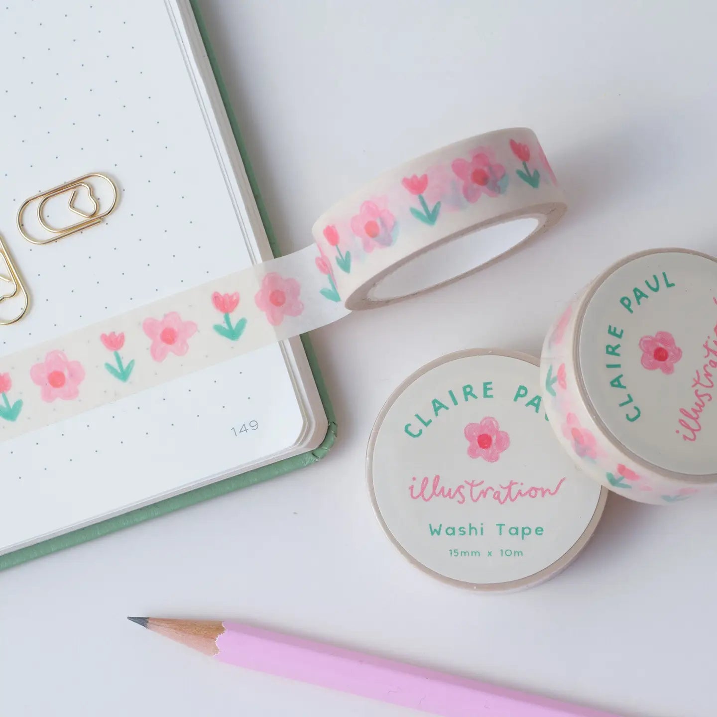 The most adorable washi tape! With a hand drawn pink floral pattern on a white background.

This paper tape is perfect for decorating your bullet journal and planners, scrapbooking & gift wrapping. It'll add some fun and colour to any surface and is easy to peel off.