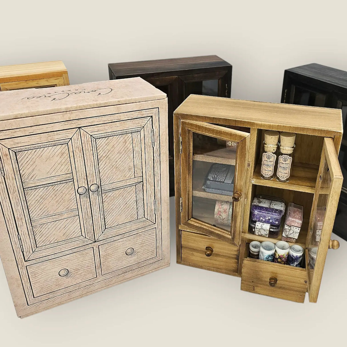 These wooden cabinets will add a beautiful decorative touch to your desk or creative space. They are also highly functional, with two drawers, and shelves of different heights. This product is handmade and an exclusive design of CoraCreaCrafts.

Important Note: This product includes the wooden cabinet only. Any decorative items on the inside are for display purposes only.

Size: 20 x 25 x 7.5cm