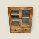 These wooden cabinets will add a beautiful decorative touch to your desk or creative space. They are also highly functional, with two drawers, and shelves of different heights. This product is handmade and an exclusive design of CoraCreaCrafts.

Important Note: This product includes the wooden cabinet only. Any decorative items on the inside are for display purposes only.

Size: 20 x 25 x 7.5cm