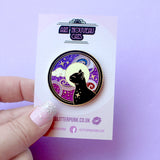This amazing Cosmic Cat features a black cat against a celestial background, done in an Art Nouveau style. The purple and blue swirls are full of glitter – this fab pin is a real conversation starter!&nbsp;

The pin is secured by two purple heart backs and comes on a special ‘Art Nouveau’ Glitter Punk backing card, making it perfect for a gift or to keep as a special treat for yourself.

This pin is part of my Art Nouveau Cats collection – 8 enamel pins based on the fabulous 19th/20th century art movement.
