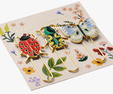 Our new Curio enamel paper clip set is specially created for teachers, parents, and more for everyday organization with a touch of flair. The enamel covering features a gorgeous design but still holds your important documents close together. Use it for organizing, flair and so much more.