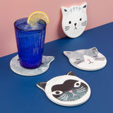 Danica Jubilee - Cats Meow Soak Up Coasters Set of 4

Made from a special super absorbent ceramic, these coasters will soak up any condensation, leaving your mug or glass drip-free. The cork backing prevents scrates on surfaces. A set of four comes packaged in a gift-ready box.
