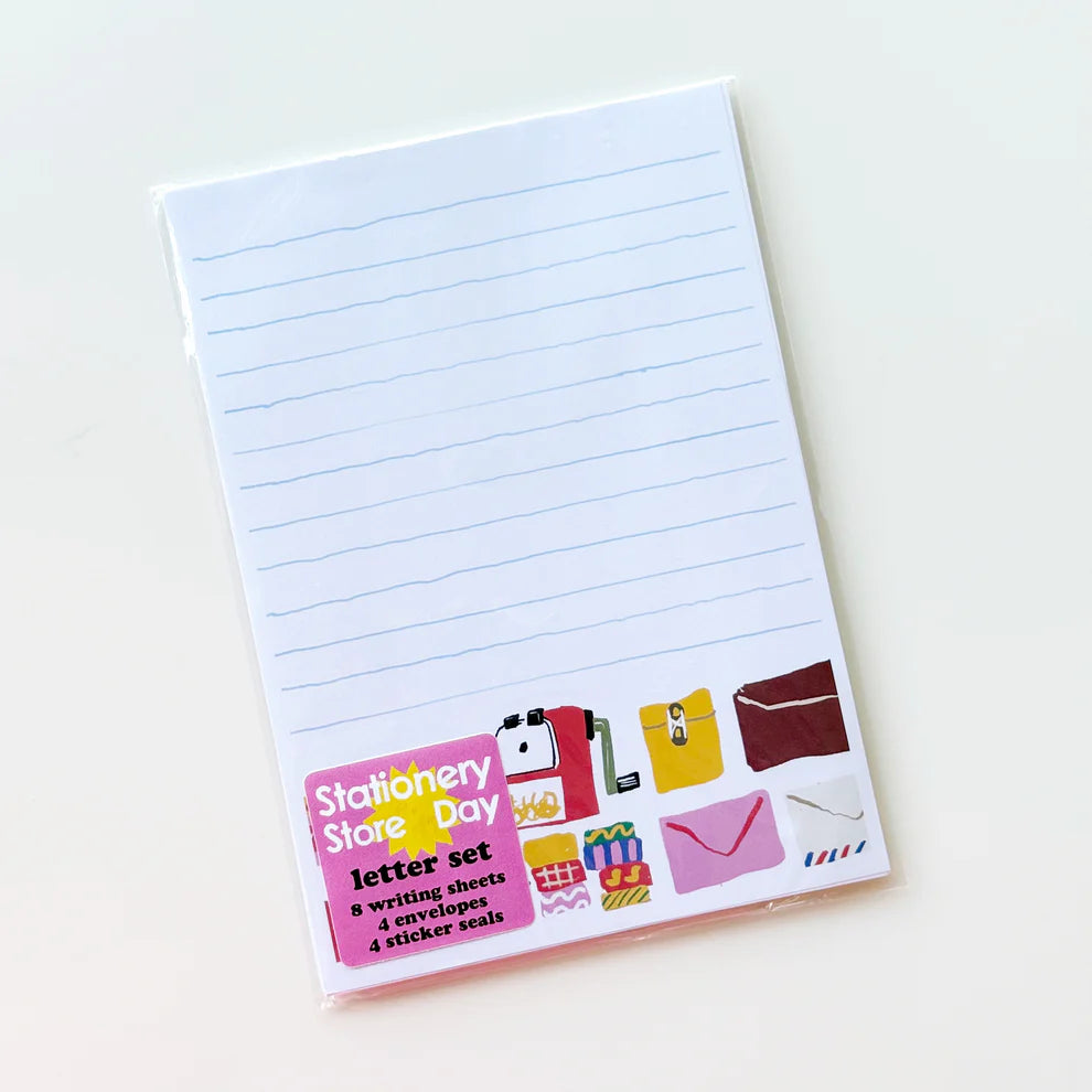 Letter writing set with a fun office supplies theme by Karen Schipper.

Set includes:

8 5.82" x 8.26" writing sheets
4 illustrated envelopes
4 sticker seals