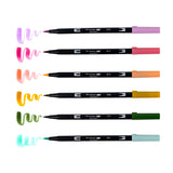 Set of 6 colors. Dual Brush Pens feature a flexible brush tip and a fine tip in one marker. The brush tip works like a paintbrush to create fine, medium, or bold strokes, while the fine tip provides consistent lines. The Teatime palette is inspired by elegant tea blends, featuring soft florals and earthy tones for a refined, calming aesthetic. The water-based ink is blendable, and the resilient nylon brush retains its point stroke after stroke. Colors include: Orchid (673), Mauve (817), Coral (873), Yellow 