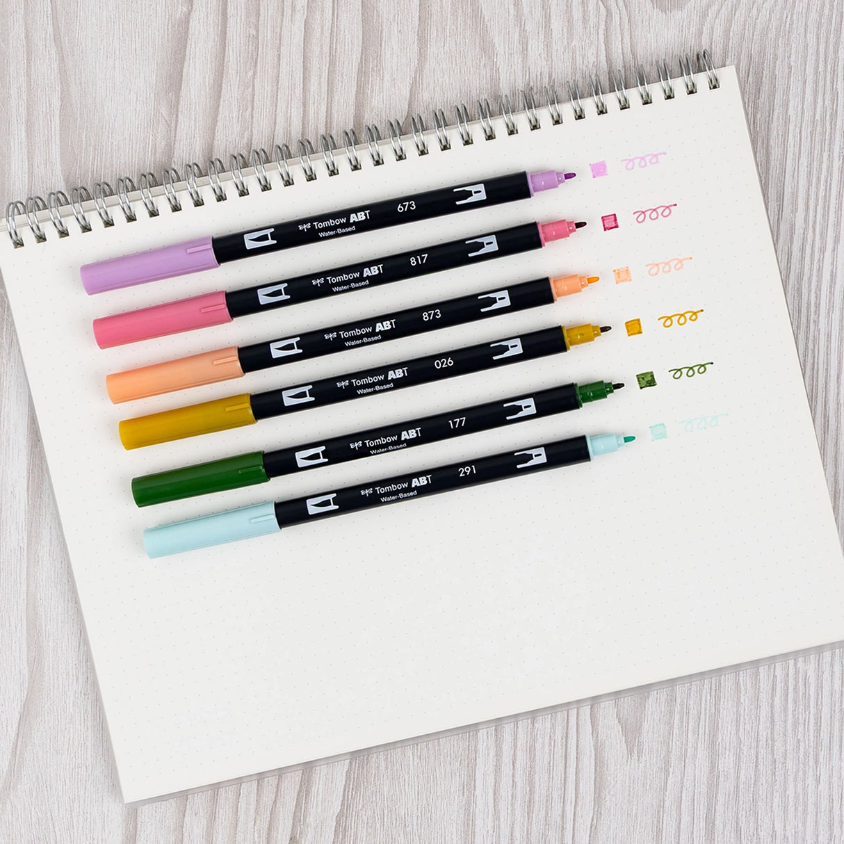 Set of 6 colors. Dual Brush Pens feature a flexible brush tip and a fine tip in one marker. The brush tip works like a paintbrush to create fine, medium, or bold strokes, while the fine tip provides consistent lines. The Teatime palette is inspired by elegant tea blends, featuring soft florals and earthy tones for a refined, calming aesthetic. The water-based ink is blendable, and the resilient nylon brush retains its point stroke after stroke. Colors include: Orchid (673), Mauve (817), Coral (873), Yellow 