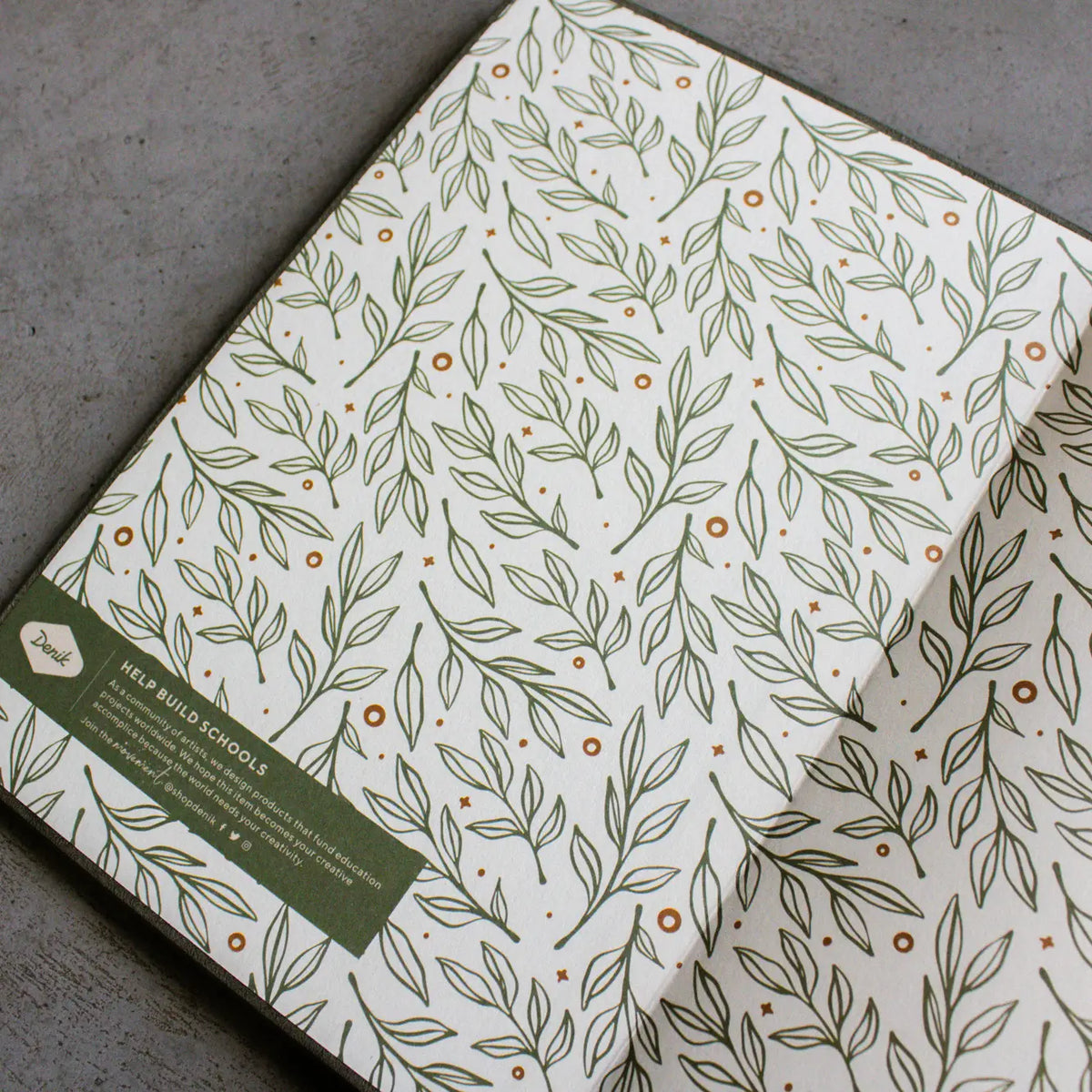 Embroidered Deer Hardbound Layflat Notebook

Premium embroidered cover and beautiful cream-colored lined pages making it easy to keep track of even the smallest details. Complete with a rich, satin ribbon allowing you to bookmark your favorite pages and experiences.

5.75" x 8.25" hardcover journal notebook
Embroidered cover artwork
144 lined pages
Glorious Smythe-sewn binding allows notebook to lay flat
Ribbon Bookmark
Durable binding and high-quality paper for a premium writing experience
Ideal for gifts,