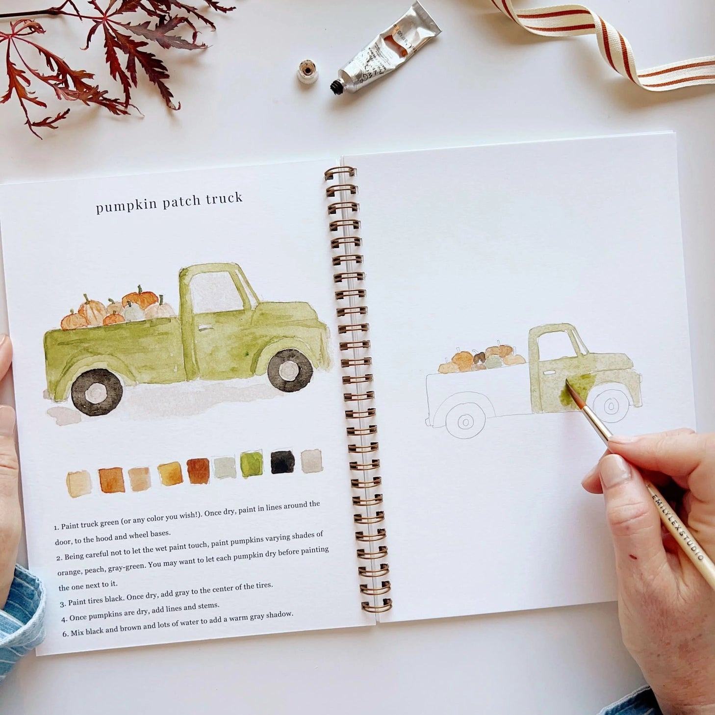 Twelve autumn illustrations — a pumpkin, squirrel, fall leaves, vintage truck, mum bouquet, fall wreath, and more — each pre-outlined with step-by-step instructions. Paintings take about thirty minutes from start to finish, making it approachable for first-time painters and a favorite for gifting.

12 beginner-friendly illustrations
Thick 120lb watercolor paper&nbsp;
Lay-flat pages with spiral binding for hassle-free painting and easy tear-out&nbsp;
Lightly outlined sketches to guide you&nbsp;
Easy to carry