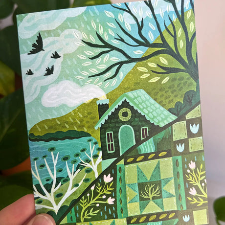 Emmylou Illustrations - Cozy Cottage Greeting Card

Spring greeting card featuring a quilt pattern and a cozy cottage. Perfect for anniversaries, birthdays, Mother’s Day, or just because! All greeting cards are hand illustrated by me!&nbsp;

Printed on premium heavyweight matte cardstock, this A2 card is blank inside—ready for your handwritten notes.

Includes a kraft envelope