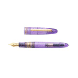Esterbrook x Sakuradragon Sakura Street Estie Fountain Pen

Created with artist Cindy Duong of Sakuradragon, the Sakura Street Estie brings her imaginative illustrated world to Esterbrook's traditional Estie fountain pen. Its U.S.-blended material combines translucent purple with colorful glitter sparkle, while the custom clip is etched with Cindy's Sakura pattern. Dual Esterbrook and Sakuradragon engraving and a gold-plated converter finish the design. Each pen arrives in special packaging with Japanese gi
