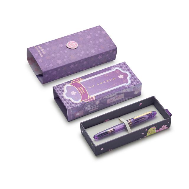 Esterbrook x Sakuradragon Sakura Street Estie Fountain Pen

Created with artist Cindy Duong of Sakuradragon, the Sakura Street Estie brings her imaginative illustrated world to Esterbrook's traditional Estie fountain pen. Its U.S.-blended material combines translucent purple with colorful glitter sparkle, while the custom clip is etched with Cindy's Sakura pattern. Dual Esterbrook and Sakuradragon engraving and a gold-plated converter finish the design. Each pen arrives in special packaging with Japanese gi