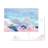 Send a note from Sakura Street with this set of three premium postcards featuring Cindy Duong's original illustrations. The set includes the Dino Sky, Dino Sakura, and Sakura Street designs, each printed on heavyweight cardstock. A custom address layout on the reverse adds more of the collection's playful artwork to every piece of correspondence.