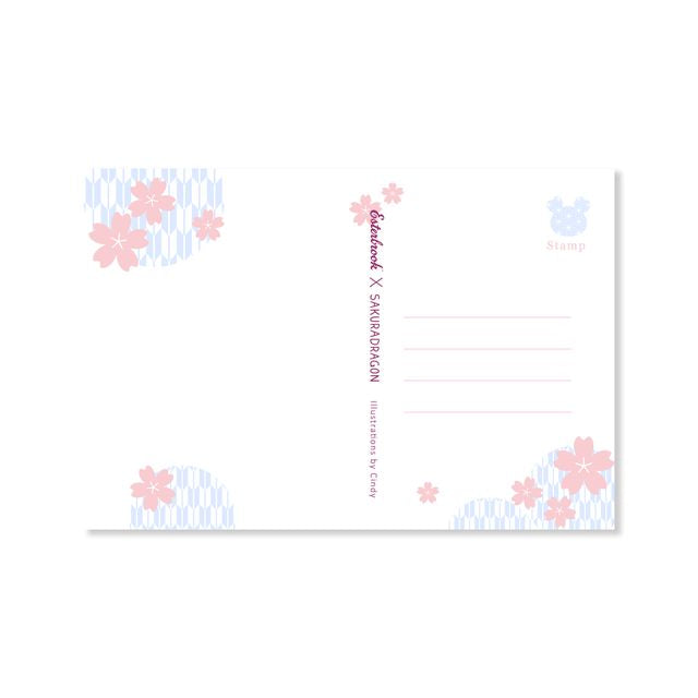 Send a note from Sakura Street with this set of three premium postcards featuring Cindy Duong's original illustrations. The set includes the Dino Sky, Dino Sakura, and Sakura Street designs, each printed on heavyweight cardstock. A custom address layout on the reverse adds more of the collection's playful artwork to every piece of correspondence.
