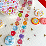 Add some color to your journal and crafts with this cute button themed washi tape designed by Veronica! This washi tape includes buttons hand-painted by Veronica and from her personal collection!

Perfect for crafts, journaling, snail mail, and more.

Size: 15mm x 10m