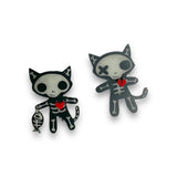 Pendientes de esqueleto de gato pescador