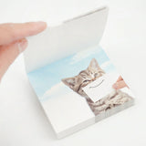 Block memo featuring a cute cat in a playful way. The design will make you smile, and it's sure to lift the hearts of those who receive it! Of course, it can be used as a daily note, as well as a small gift card or message card.