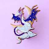 Glitter Punk - Celestial Dragon Enamel Pin

This fabulous starry Celestial Dragon pin is perfect for fans of the mythical!

Made from gold hard enamel, this 48mm purple dragon is surrounded with glittery clouds and a large gold crescent moon. It is secured with two purple heart rubber clasps.