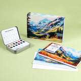 Grabie Watercolor Coloring Club Box - Landscape

A Landscape Coloring Journey – Perfect for nature lovers! This bundle includes a portable watercolor set and a beautifully illustrated coloring book, ideal for all skill levels. Enjoy a relaxing coloring experience.

Perfect Pairing for Nature Lovers – Thoughtfully designed, this set features a 12-color watercolor pocket set, curated with shades that capture the essence of nature, and a 15-sheet, 140LB landscape-themed watercolor coloring book. 