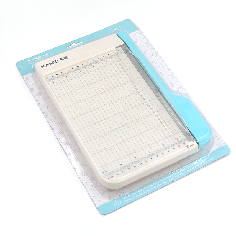 Built with a durable metal and plastic construction, this trimmer is perfect for craft rooms, classrooms, offices, and everyday projects. Its compact size makes it easy to store, while the sharp guillotine blade delivers smooth, straight cuts ideal for photos, cardstock, planner inserts, and more. Cleanly cuts 3 sheets of cardstock up to 9 inches.

Whether you're crafting, scrapbooking, or prepping materials for work, this cutter offers reliable performance in a convenient, easy‑to‑use design.