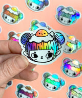"Egg Buns" Vinyl Sticker made from Hannakin illustration with holographic accents (hair and egg yolk) and shiny gloss finish.

Made from a durable waterproof vinyl with a matte laminate that protects it from scratching, rain and sunlight.