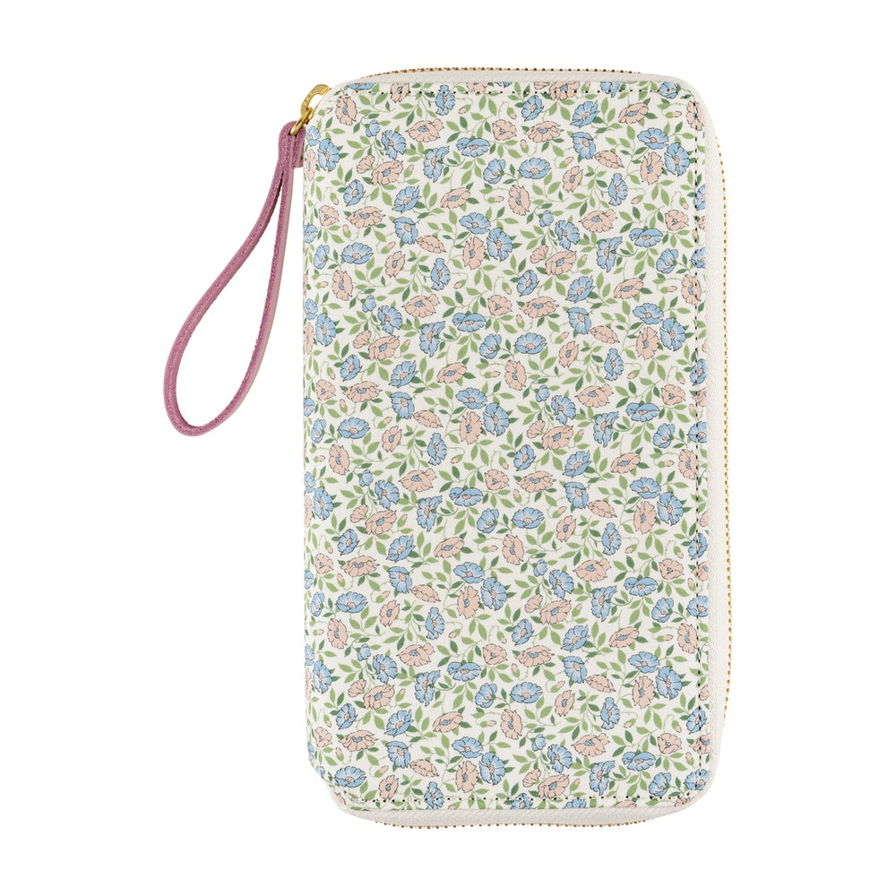 A brand born in England, Liberty Fabrics has gained fans around the world, and this zipper-type cover for the Weeks features their printed fabric.