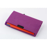 On the back is another handy pocket for quick-access items like tickets or small notebooks. A “HANDWRITE” tag adds a playful finishing touch.
