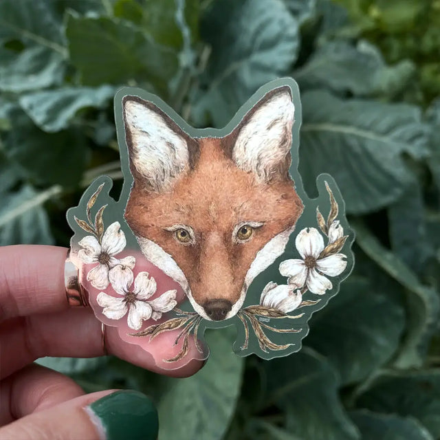 Vinyl semi-transparent sticker of an antique sewing machine and rose, illustrated by Jessica Roux.

The background of the sticker is transparent, but the sewing machine and rose are opaque.

Sticker measures approximately 2.6" x 2.1" and is glossy.