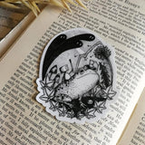 Sticker featuring a little robot and his faithful frog companion making their way through the haunted graveyard, from original pen and ink artwork by Jon Turner.