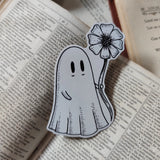 Die-cut vinyl sticker featuring an adorable ghostie pal with a flower for you! Design from an original Jon Turner ink drawing.
