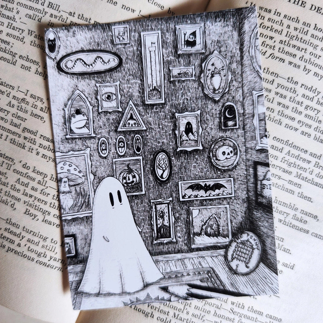 A little ghost and their gallery of art, printed on a sticker to add some spooky charm to your laptop, water bottle, or any other surface. From my original pen and ink artwork.