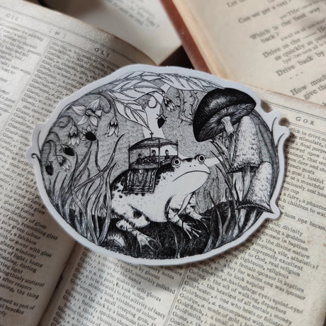 Ding ding ding, all aboard the froggy express! A lovely die-cut vinyl sticker from original pen and ink artwork by Jon Turner.