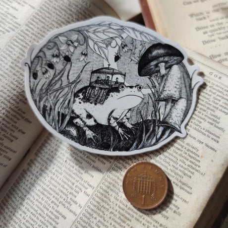 Ding ding ding, all aboard the froggy express! A lovely die-cut vinyl sticker from original pen and ink artwork by Jon Turner.