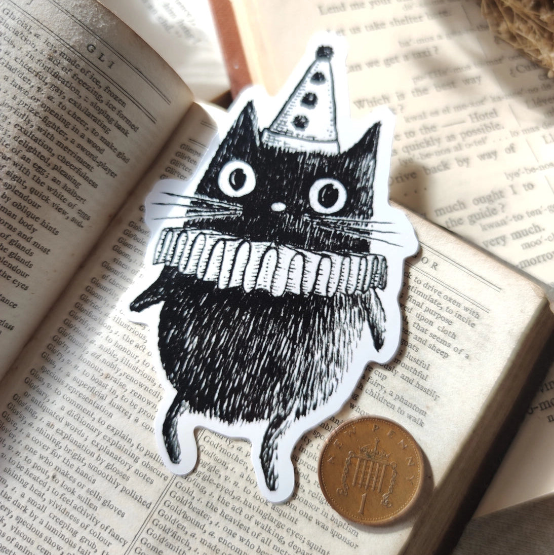 It's Simon! Just a silly little circus lad on a lovely die-cut vinyl sticker, design from original pen and ink artwork by Jon Turner.