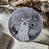 A little Van Gogh-inspired ghostie holding a sunflower beneath a starry night sky, from an original ink drawing by Jon Turner.