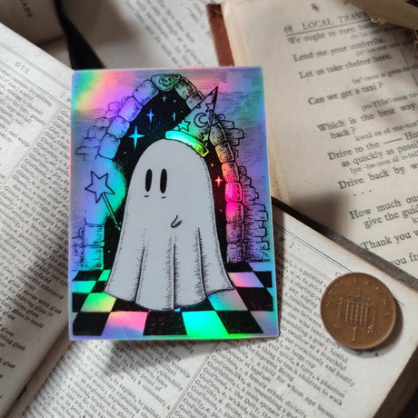 A magical ghostie off on a quest! A shiny quest! A lovely holographic sticker from original pen and ink artwork by Jon Turner.