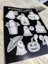 A collection of nine mini ghosts being spooky but generally wholesome, from original ink artwork by Jon Turner.

On an A6 (105x148mm) sized vinyl sheet.

Each sticker is kiss cut for easy peeling and sticking to your laptop, phone, lunchbox, notebook or any other surface you feel needs a bit of spookification.