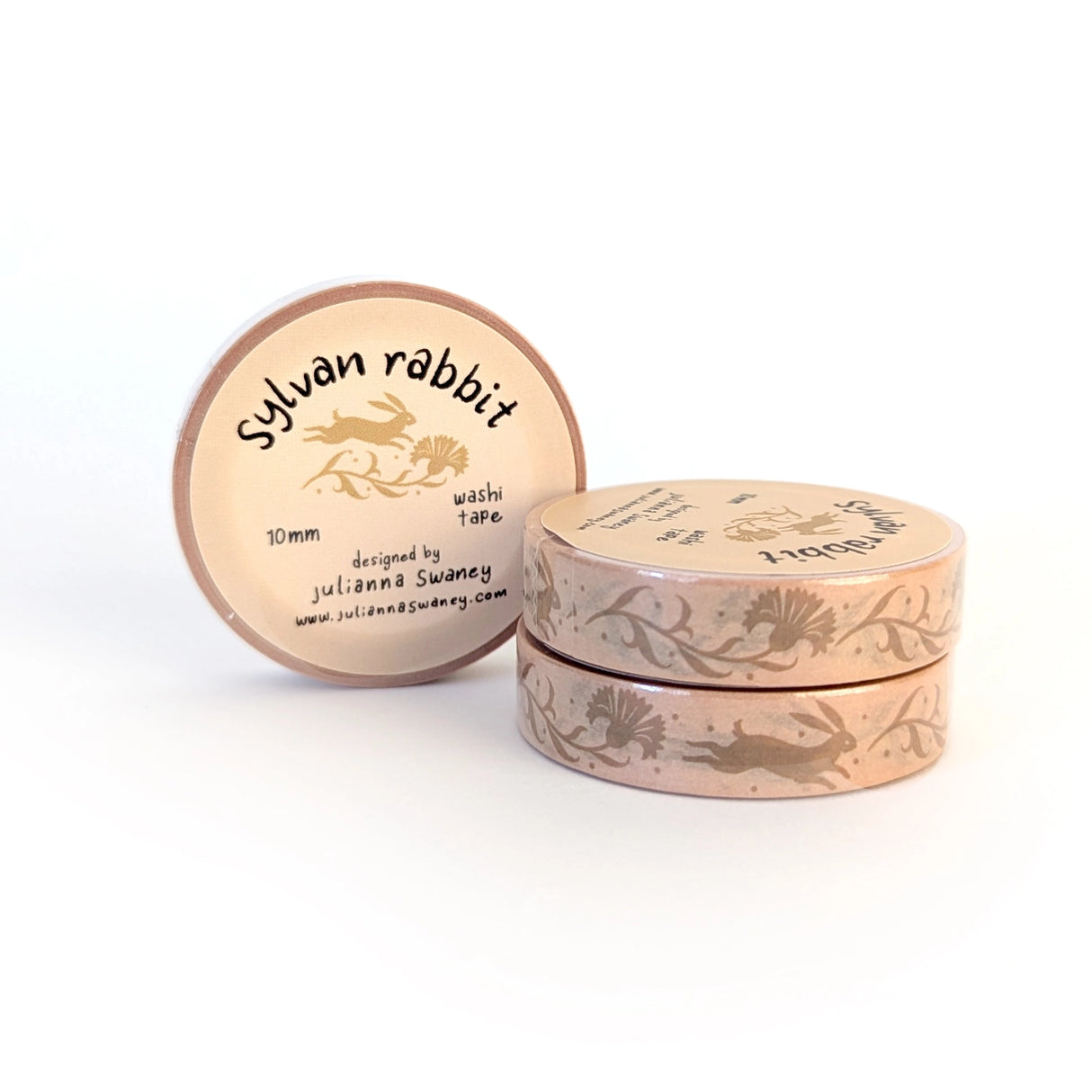 This narrow washi tape features a charming design of swift rabbits and dianthus flowers