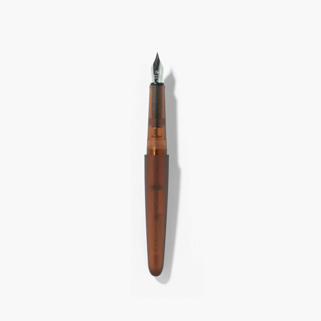 A pen that evokes the texture of frosted glass. Its translucency reveals the internal mechanism as an aesthetic feature. Careful consideration of form and colour palette ensures an elegant presence, even when not in use.&nbsp;

The pen is equipped with thoughtful functionality, including an extended grip section and a screw cap designed for quick access with minimal turns. The visible ink level allows for easy refills.

Available in a Fine and Medium nib
Includes converter
Steel nib
